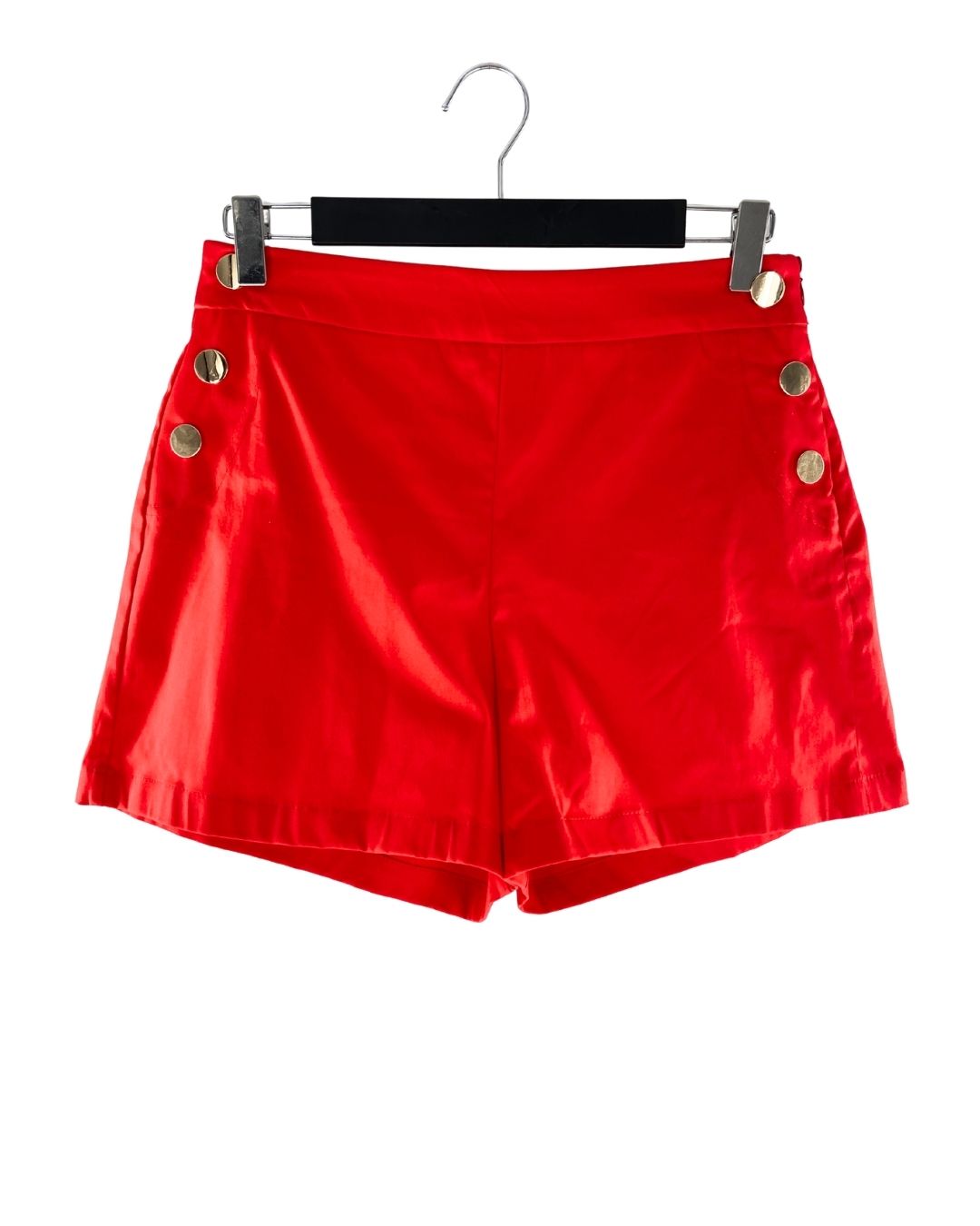 Short mini con botones dorados