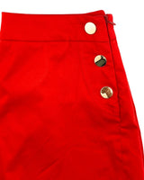 Short mini con botones dorados