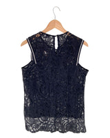 Blusa sleeveless en blonda