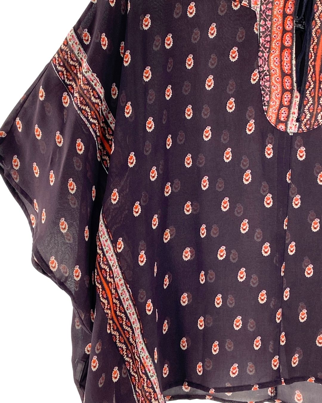 Blusa traslúcida oversize