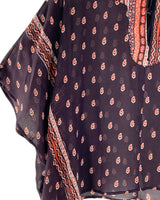 Blusa traslúcida oversize