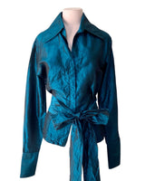 Blusa satinada abotonada