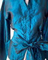 Blusa satinada abotonada