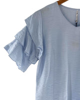 Blusa con vuelos en mangas