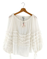 Blusa mangas anudadas