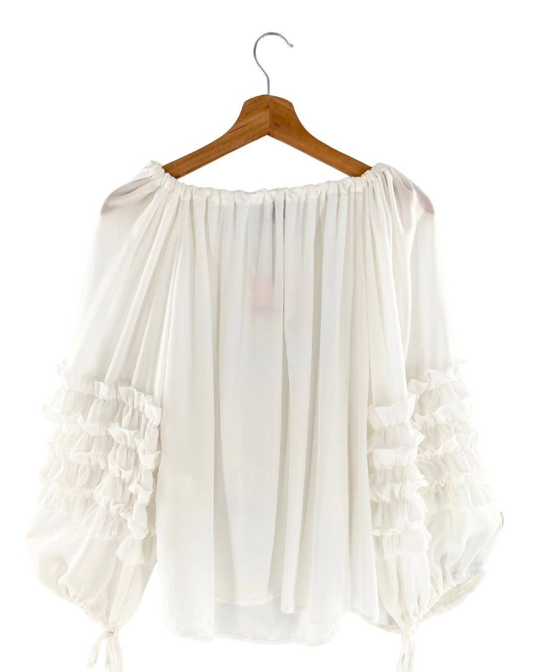 Blusa mangas anudadas