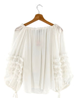 Blusa mangas anudadas