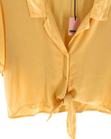Camisa crop manga corta