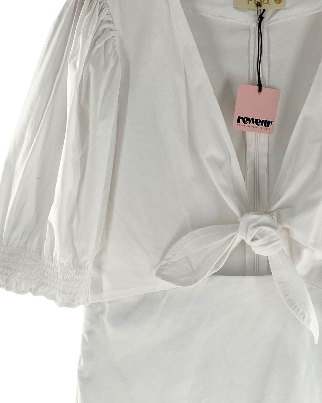 Blusa manga encauchada anudada