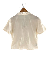 Camisa crop manga corta
