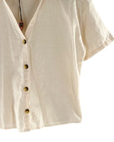 Camisa crop manga corta