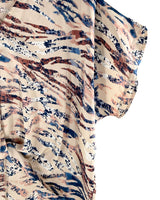 Blusa high and low satinada con