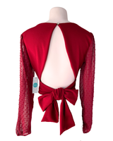 Blusa anudada en espalda