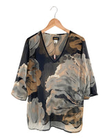 Blusa traslúcida con print