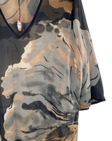 Blusa traslúcida con print