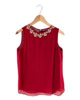 Blusa sleeveless con recamado