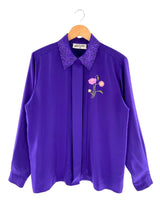 Camisa satinada con bordado