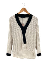 Blusa manga larga