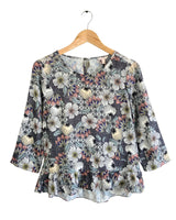 Blusa manga larga con vuelo