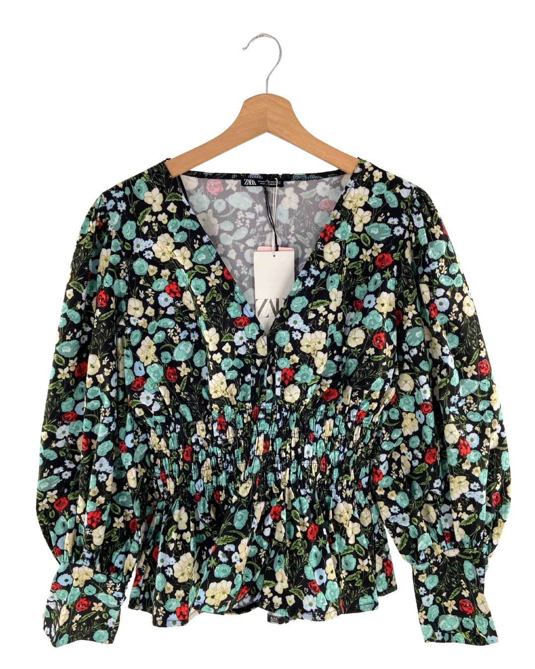 Blusa encauchada en cintura
