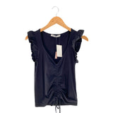 Blusa en punto con recogido