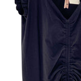 Blusa en punto con recogido