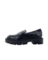 Loafers con textura suela alta