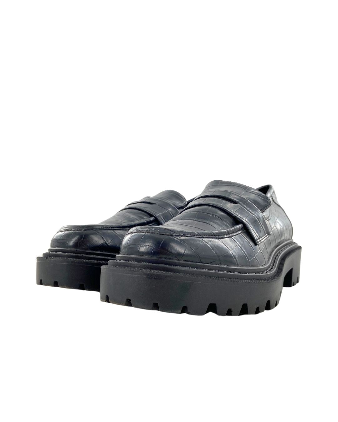 Loafers con textura suela alta