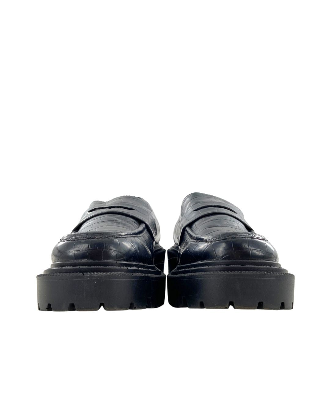 Loafers con textura suela alta
