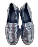 Loafers con textura suela alta