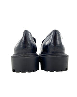 Loafers con textura suela alta