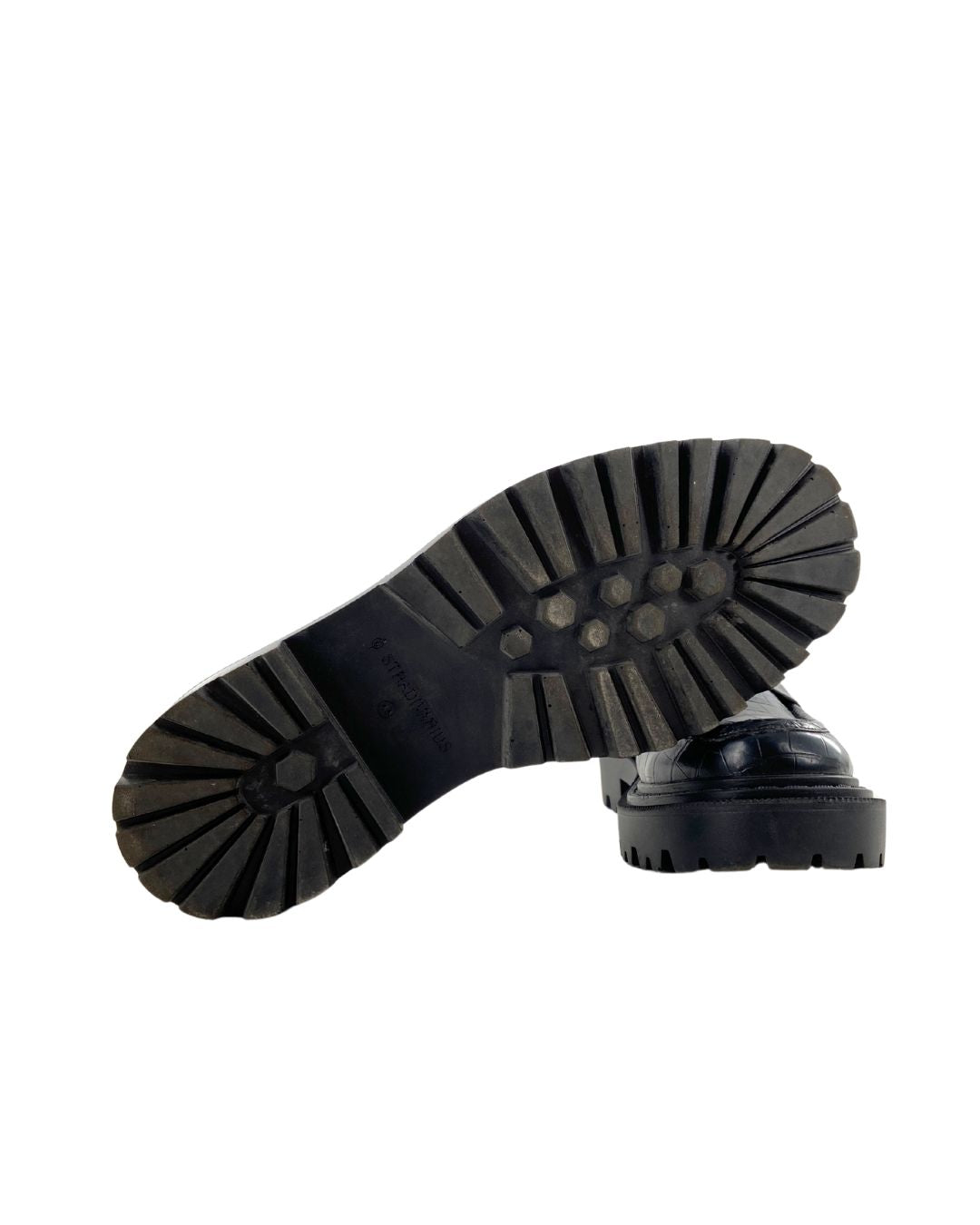 Loafers con textura suela alta
