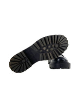 Loafers con textura suela alta