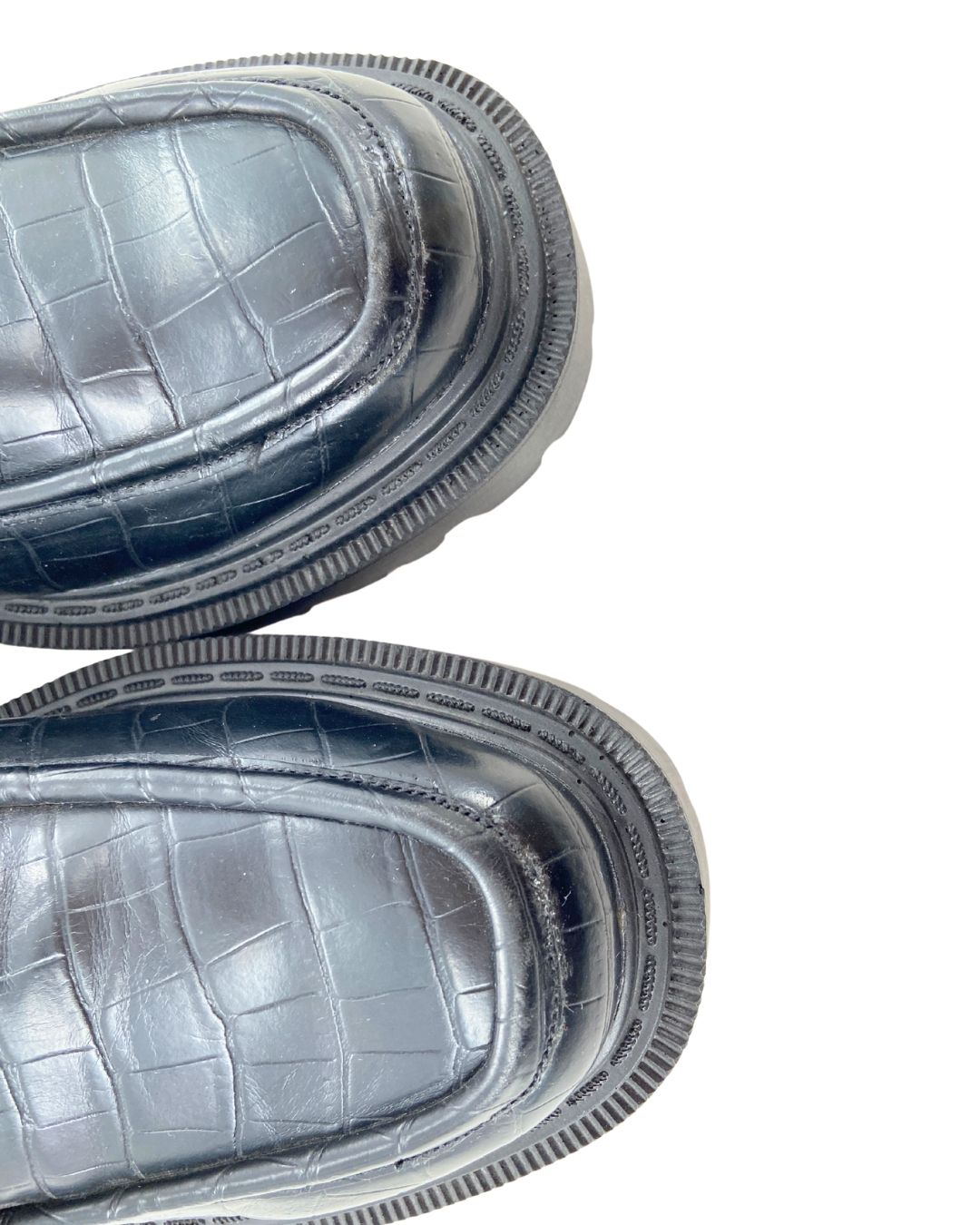 Loafers con textura suela alta