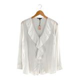 Blusa manga larga con vuelos