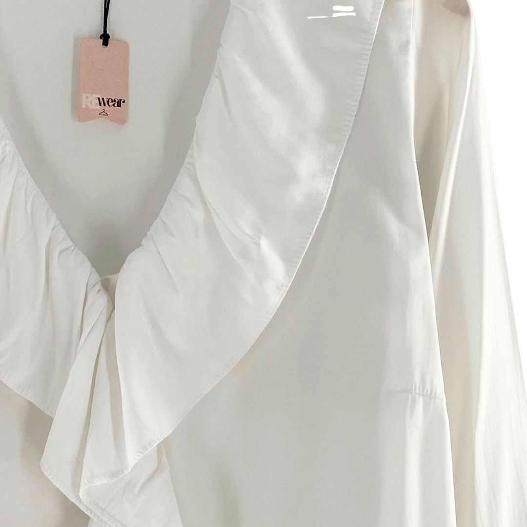Blusa manga larga con vuelos