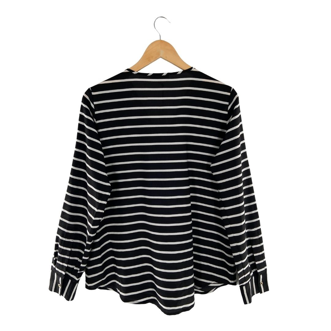 Blusa manga larga a franjas