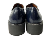 Loafers glossy con textura