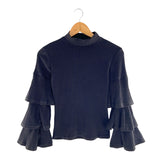 Blusa en canalé cuello alto