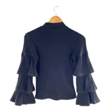Blusa en canalé cuello alto