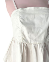 Blusa crop strapless con vuelo