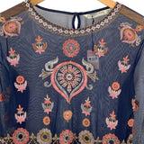 Blusa en malla translúcida