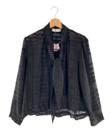 Blusa traslúcida a cuadros
