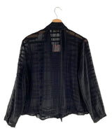 Blusa traslúcida a cuadros