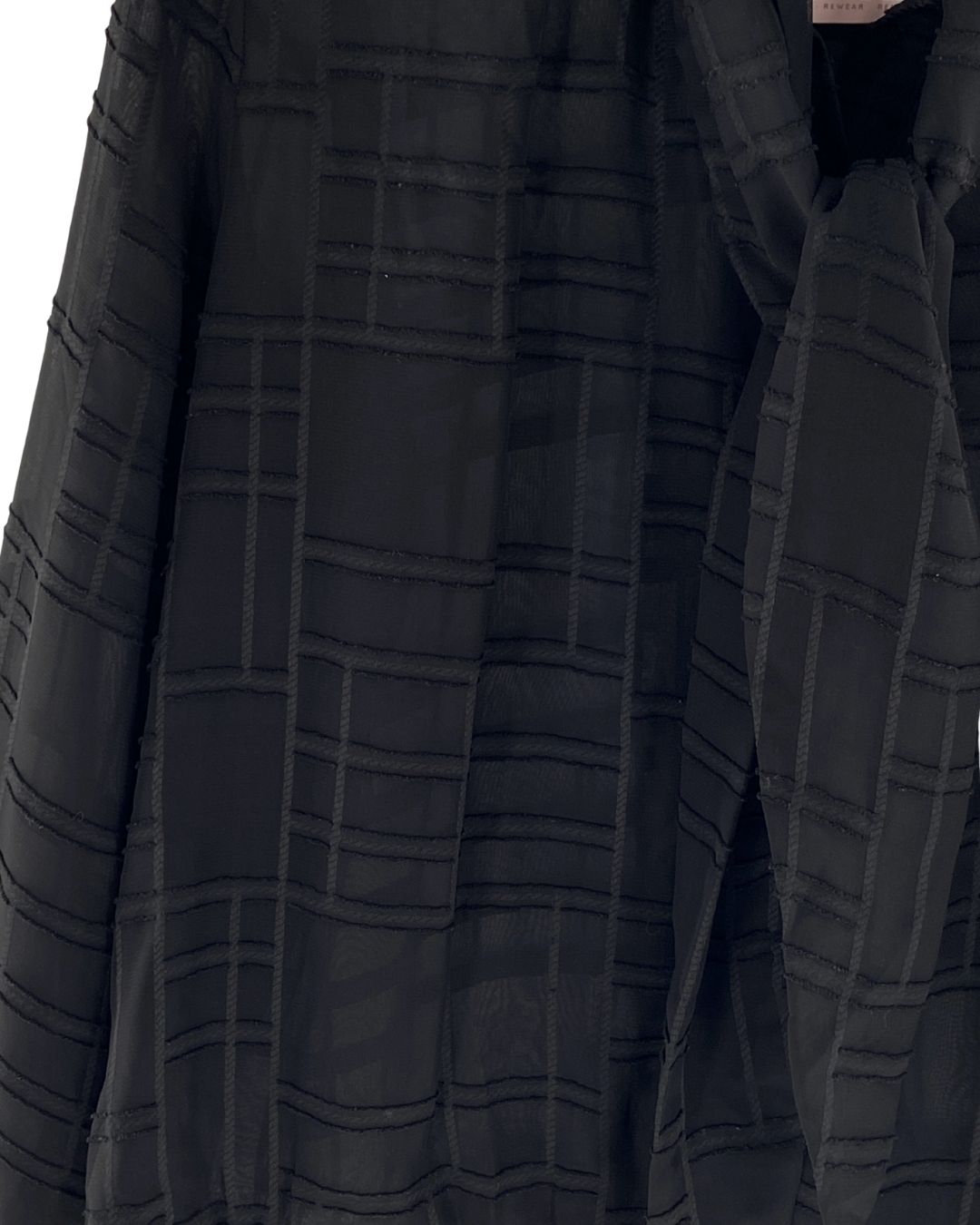Blusa traslúcida a cuadros