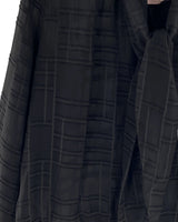 Blusa traslúcida a cuadros