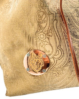 Morral en cuero estampado