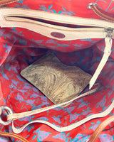 Morral en cuero estampado