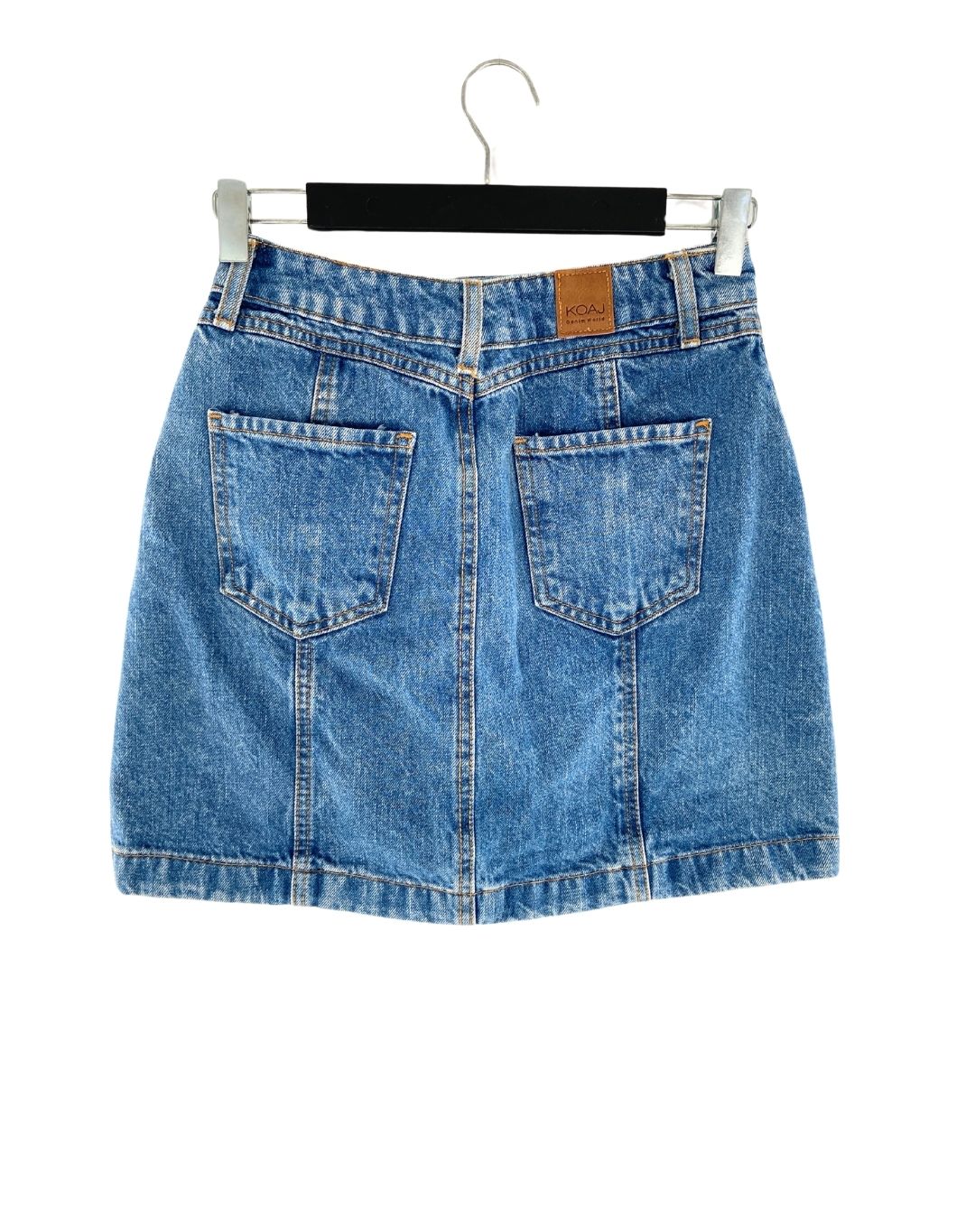 Falda mini en denim rígida