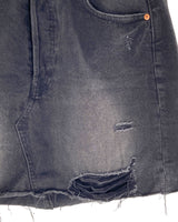 Falda mini en denim rígida
